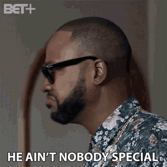 a man wearing sunglasses and a floral shirt says he ain t nobody special