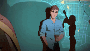 a man in a blue shirt stands in front of a map with a shadow