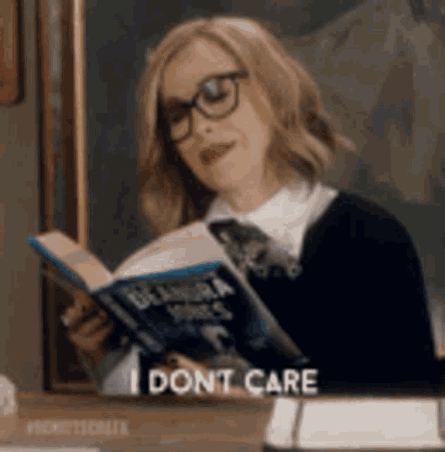 a woman wearing glasses is reading a book and saying `` i don 't care '' .