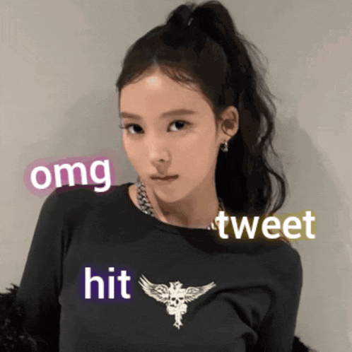 a girl with a ponytail is wearing a black shirt that says " omg tweet hit "