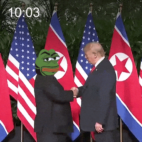 donald trump and kim jong un are shaking hands in front of flags .