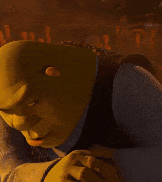 shrek from the animated movie shrek is smiling