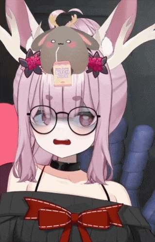 a girl with glasses and a box on her head that says bitch drink