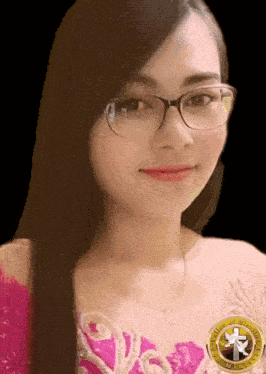 a woman wearing glasses and a medal with a cross on it is a member of the church of jesus christ of latter day saints