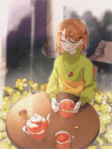 a girl in a green sweater sits at a table with a cup of tea and a teapot
