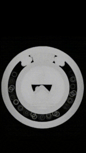 a black and white photo of a batman logo on a black background