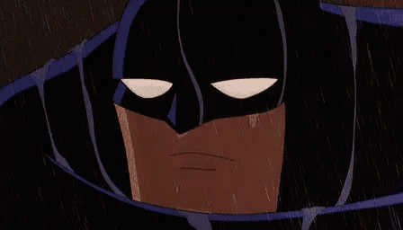 a close up of a cartoon character 's face in the rain with a sad look on his face .