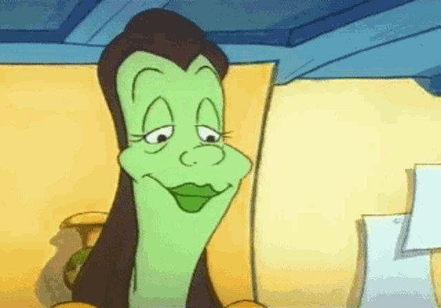 a cartoon character is sitting on a couch with a piece of paper in front of him .