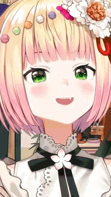 a close up of a girl 's face with pink hair and green eyes