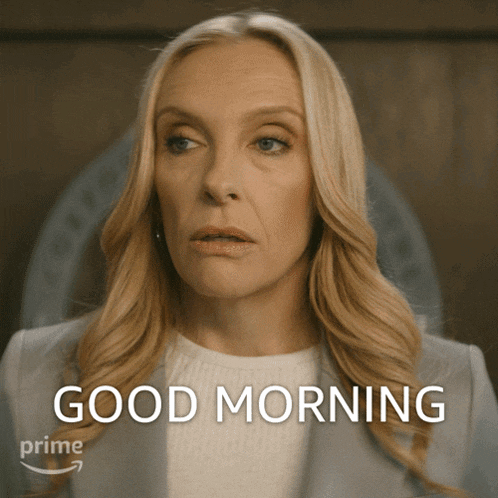 a woman with blonde hair says good morning