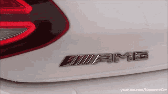 a close up of a white amg car