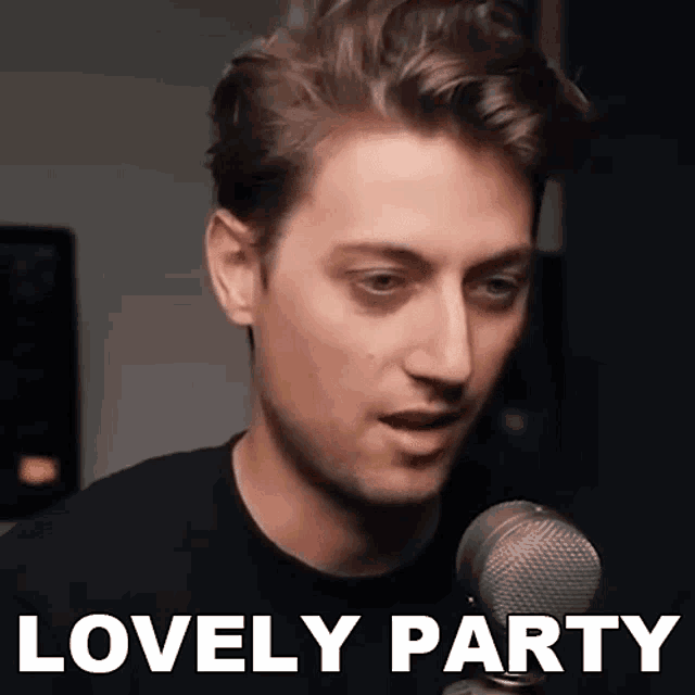 a man in a black shirt is talking into a microphone and the words lovely party are below him