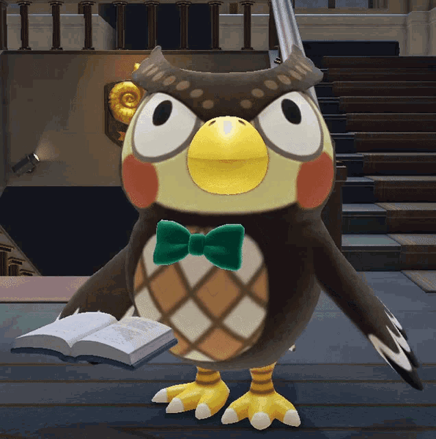 a stuffed animal with a green bow tie is holding an open book