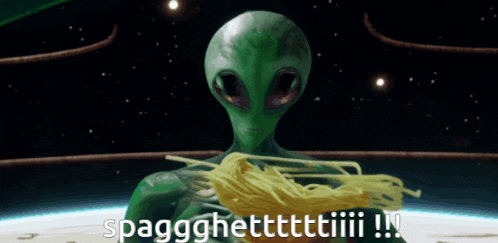 a green alien is holding spaghetti in his hands and says spagghettttttiii !!!