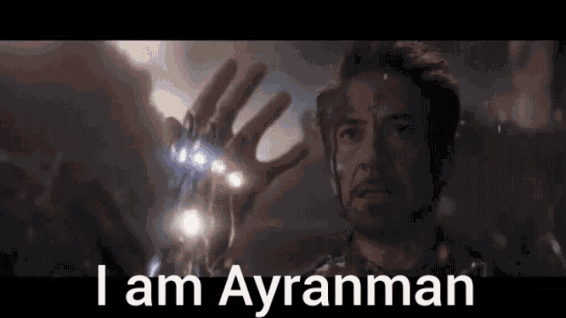 a close up of a man 's hand with the words `` i am ayranman '' written on the bottom .