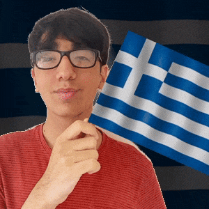 a man wearing glasses holds a blue and white flag