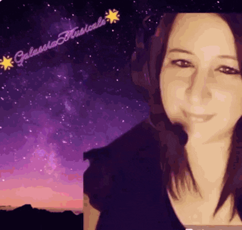 a woman wearing headphones is smiling in front of a purple sky