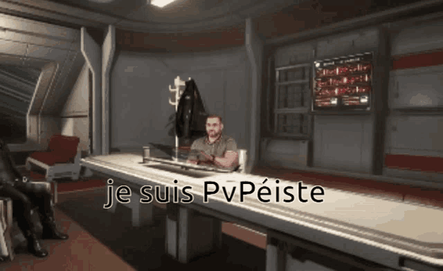 a man sitting at a table with the words je suis pvpeiste written on it