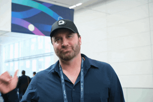 a man wears a lanyard that says globaltag