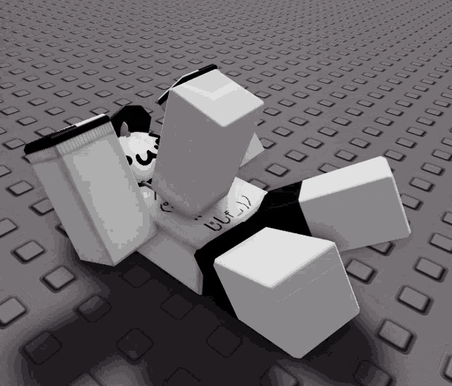 a black and white cube with the word buf on it