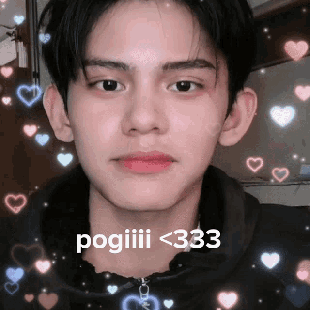 a close up of a person 's face with the words pogiii <333 on the bottom