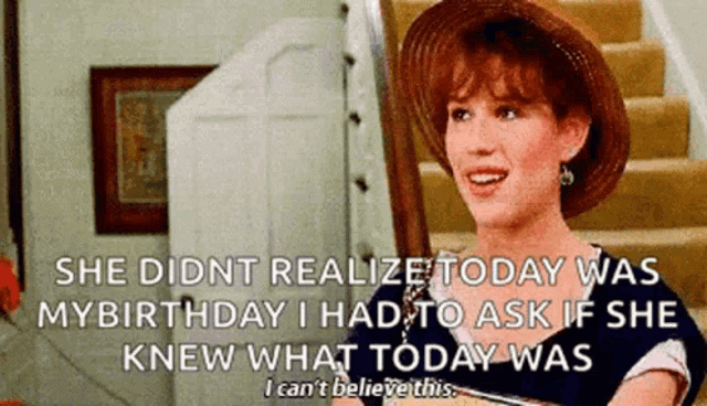 a woman wearing a straw hat is smiling and talking about her birthday