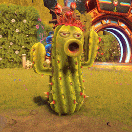 a green cactus with a red flower on top of it