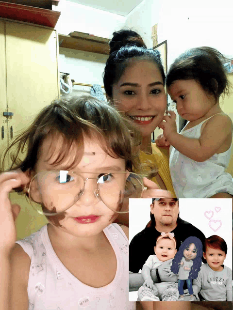 a little girl wearing glasses and a picture of a family