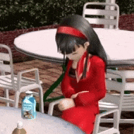 a girl in a red dress is sitting at a table with a carton of milk on it
