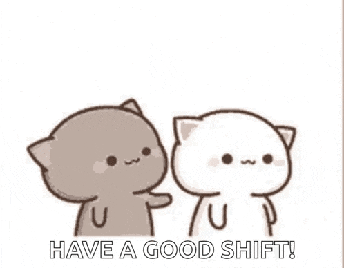 a couple of cartoon cats are standing next to each other .