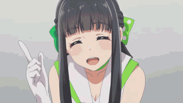 a girl with long black hair is wearing a green and white outfit