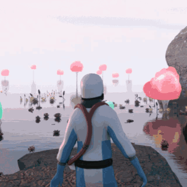 a man in a blue and white suit with a red backpack stands in front of a body of water