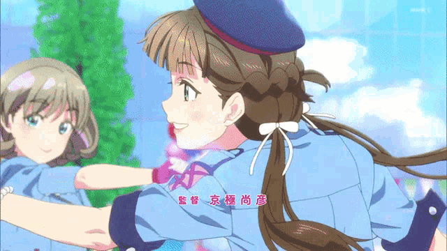 a girl in a police uniform is holding another girl in her arms