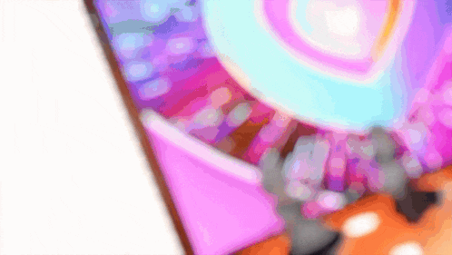 a close up of a cell phone screen with a pink and blue background