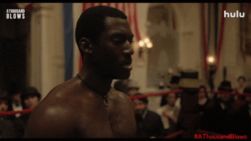 a man in a boxing ring with #athousand blows on the bottom