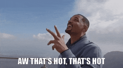 a man says aw that 's hot that 's hot with his fingers in the air