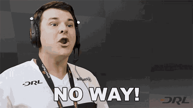 a man wearing headphones and a lanyard that says drl