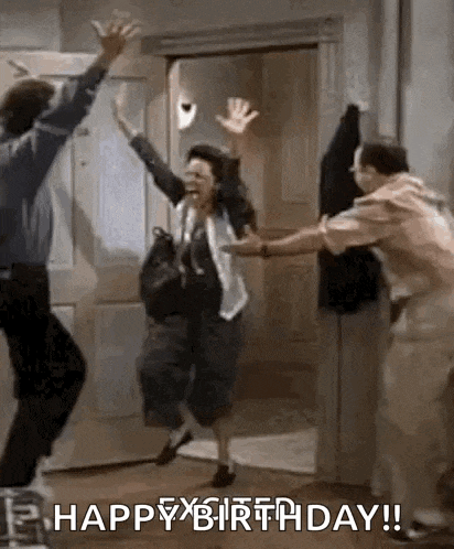 a woman is jumping in the air while a man holds her hand .