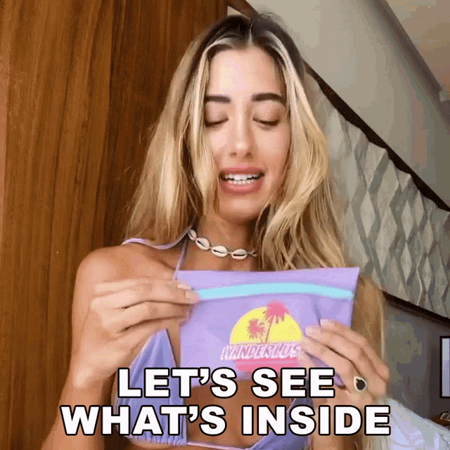 Lets See Whats Inside Jessica Serfaty GIF - Lets See Whats Inside Jessica Serfaty Lets Find Out Whats In Here GIFs