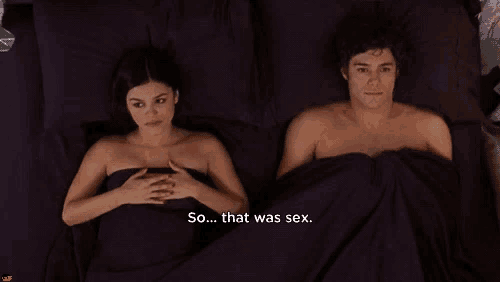 a man and a woman are laying on a bed and the woman says so that was sex