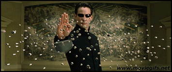 Neo Stoping Bullets GIF - Neo Matrix Bullets GIFs