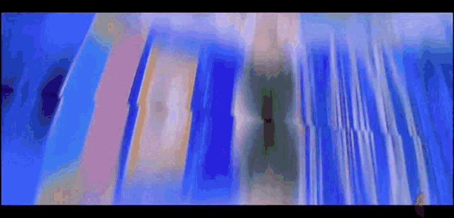 a blue background with a few lines of light