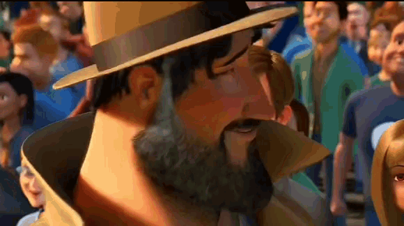 a man with a beard wearing a hat is standing in a crowd .
