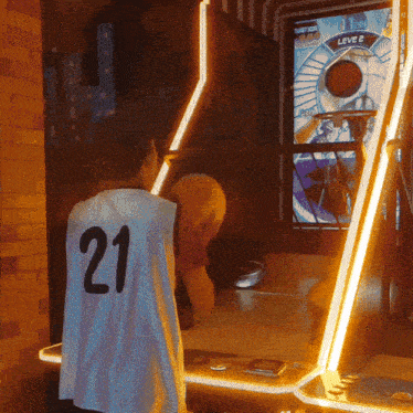 a man wearing a number 21 jersey playing a game