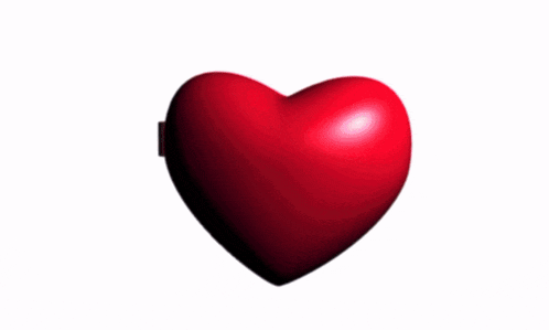 a heart shaped mirror with a picture of a man in a boxing ring on it