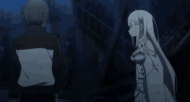 a man and a woman are standing next to each other and the man is holding the woman 's hand