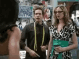 a man and a woman standing next to each other