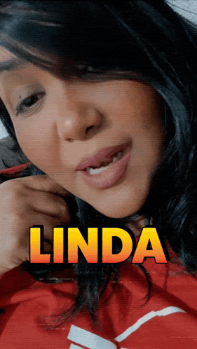 a close up of a woman 's face with the name linda written above her