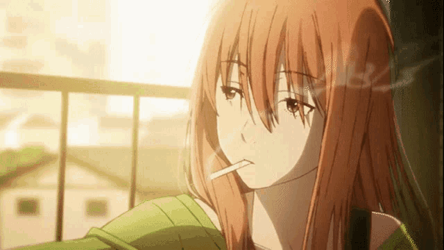 a girl with long red hair is smoking a cigarette on a balcony