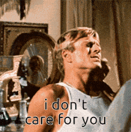 a man in a white tank top says i don t care for you
